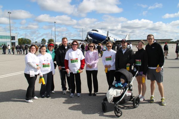 Ritchie Shortt & Tully LLP team with spouses, friends and family participated in the 2012 Hearth Place 5K on the Runway fundraising event.